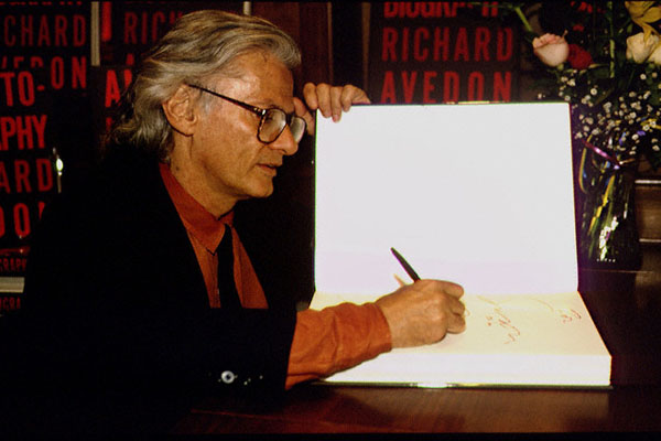 RICHARD AVEDON SIGNING HIS AUTOBIOGRAPHY